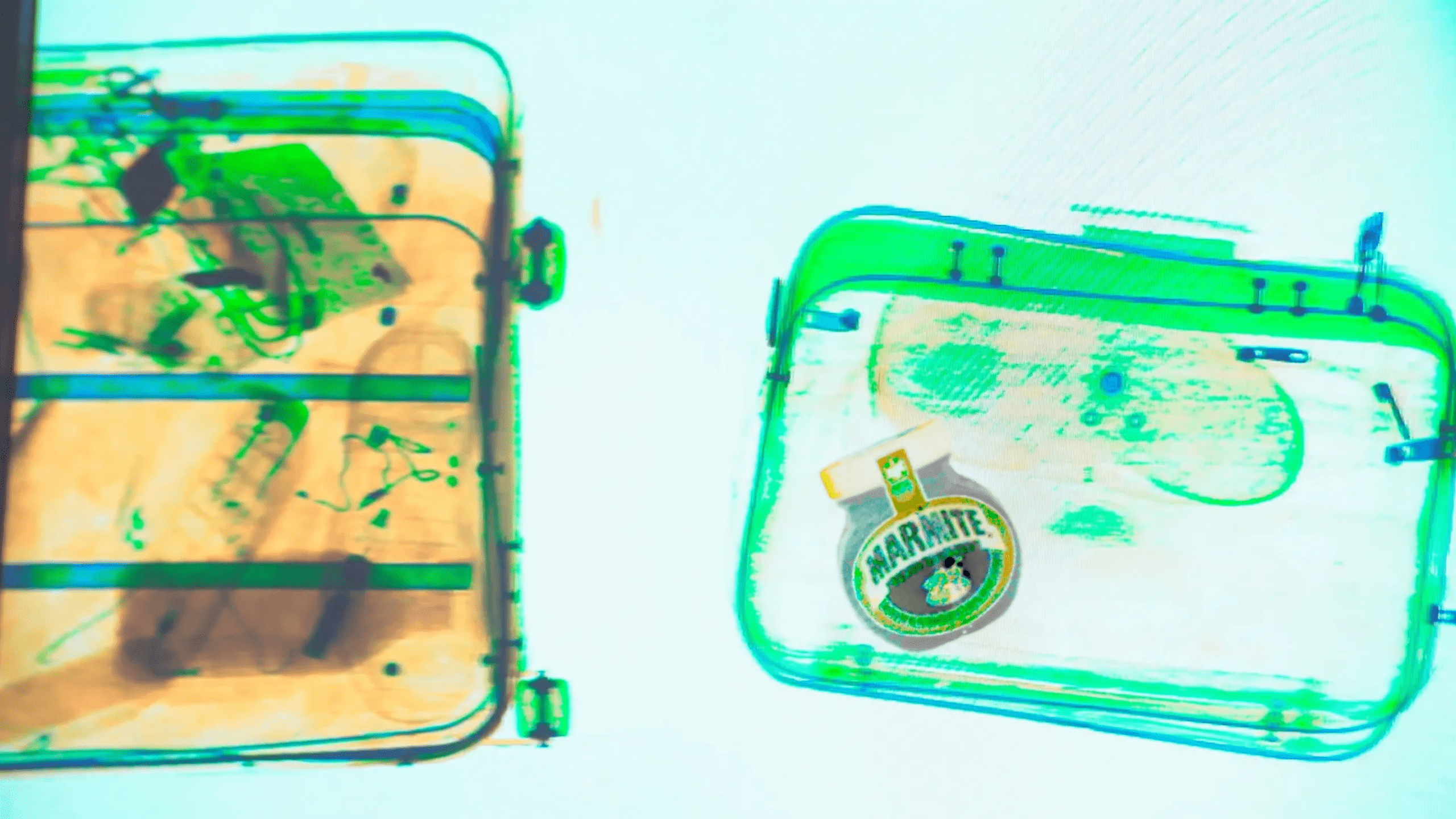 An x-ray image of a suitcase with a jar of marmite inside
